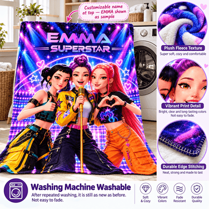 A colorful custom fleece blanket featuring three cartoon girl characters under the text 'EMMA SUPERSTAR' in a bedroom setting. The image includes feature callout circles on the right showing plush fleece texture, vibrant print detail, and durable edge stitching, along with a washing machine washable badge on the bottom left.