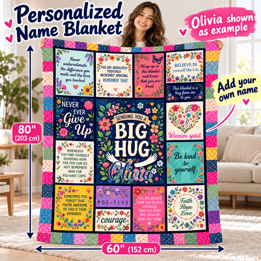 A colorful personalized name blanket with floral and quote panels is shown draped over a woman in a living room. The blanket features multiple square patches with different designs, flowers, butterflies, and motivational quotes, including the customizable text 'Sending you a BIG HUG Olivia' and 'Add your own name.