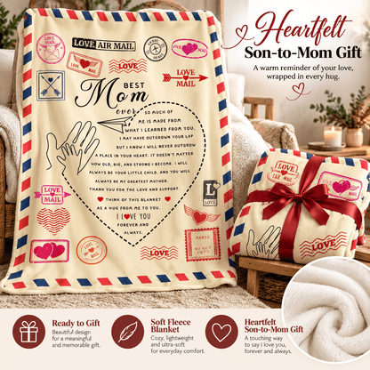 A heart-shaped fleece blanket and matching pillow set styled as a 'Son-to-Mom Gift' with vintage airmail-inspired red, white, and blue borders and stamp graphics. The blanket features a large central heart with a handwritten message and the words 'Best Mom Ever.