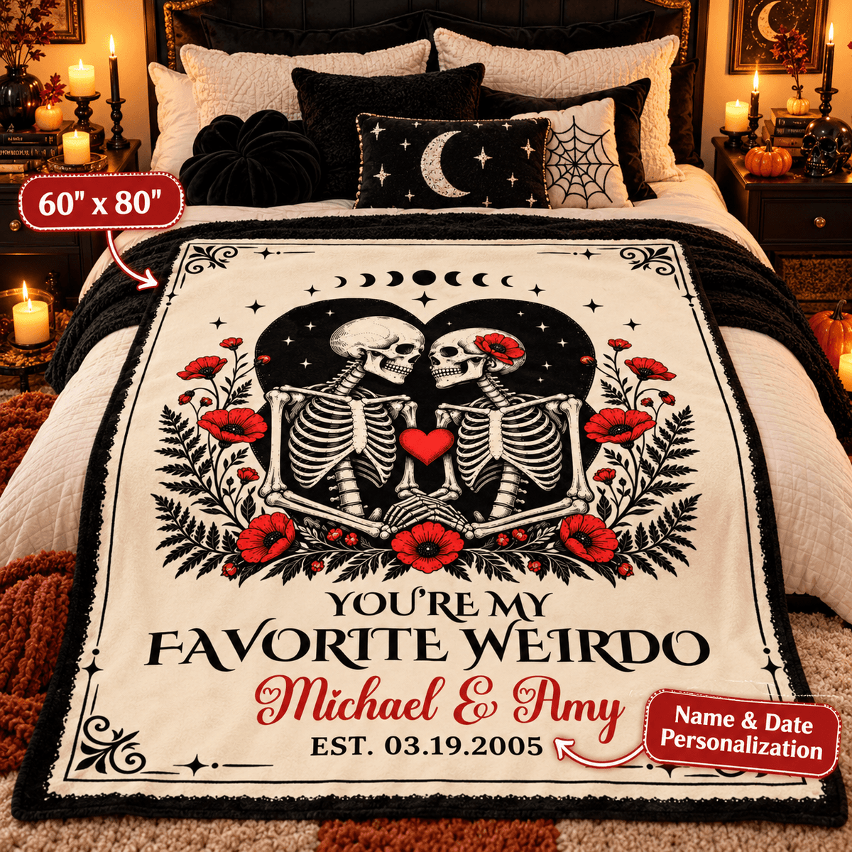 A personalized gothic-themed blanket displayed on a bed in a cozy, dimly lit bedroom. The blanket features a cream background with a black and white skeleton illustration, red poppy flowers, a red heart, and custom text reading 'YOU'RE MY FAVORITE WEIRDO Michael & Amy EST.