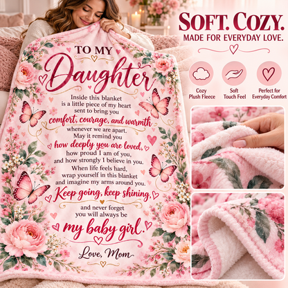 A pink floral blanket with a sentimental poem for a daughter, shown being held by a woman in a cozy bedroom setting. The image includes feature callouts and texture close-ups.