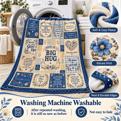 A patchwork fleece blanket with a blue and cream design featuring floral prints and motivational quotes, displayed in front of a washing machine with feature callout circles on the right and a banner at the bottom stating 'Washing Machine Washable'.