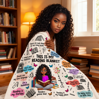 Woman holding a personalized reading blanket featuring book lover quotes